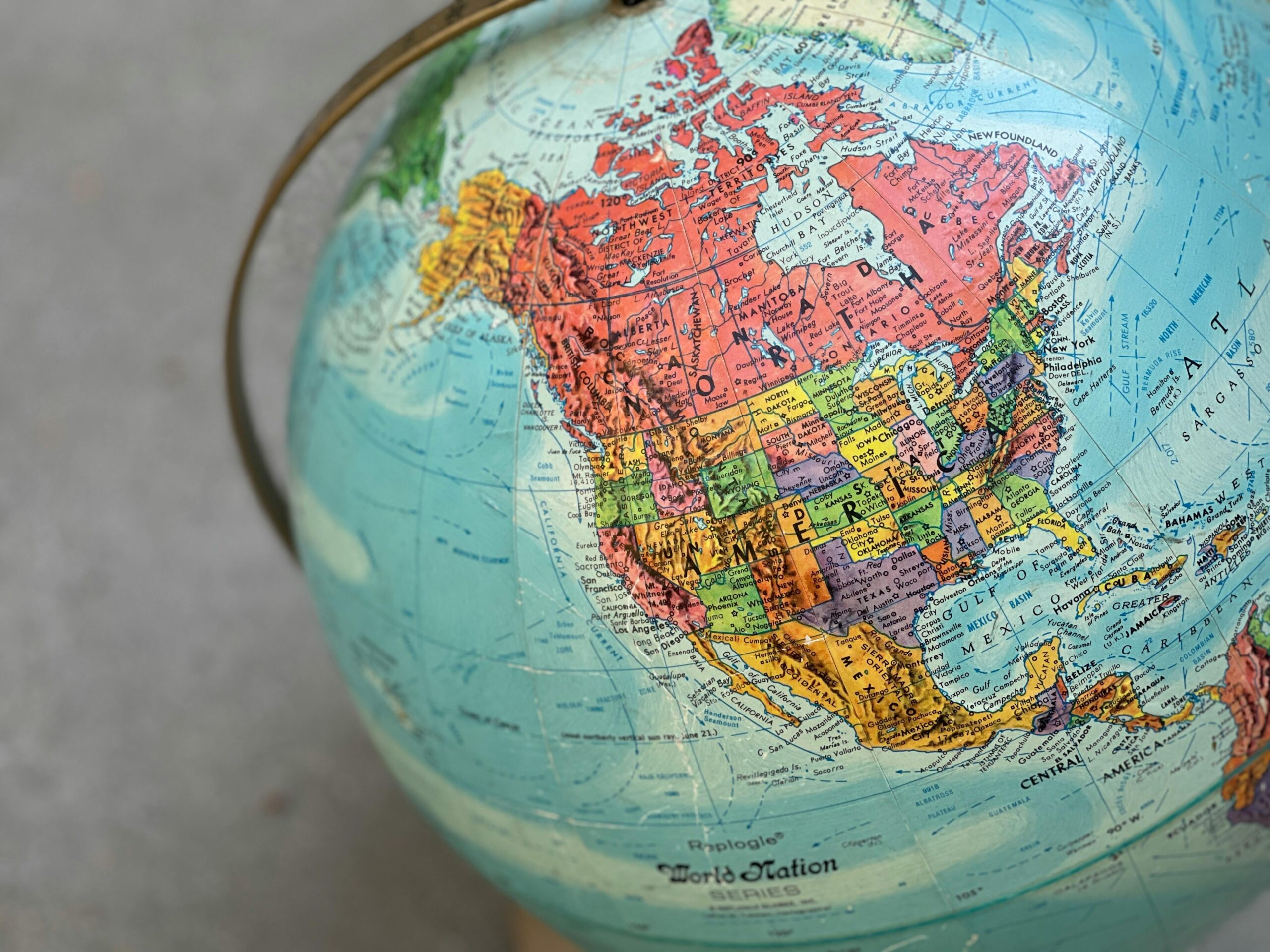 Close-up of a vintage globe showcasing North America with vibrant colors and detail.